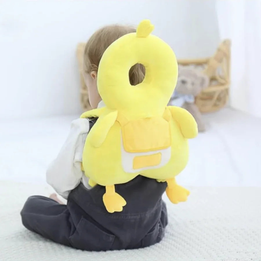 Infant sitting with Chick head protection bag