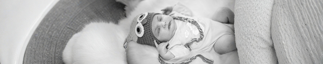 calm baby felt asleep on soft cushion